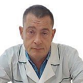 Врач Ленюшкин Эдуард Николаевич